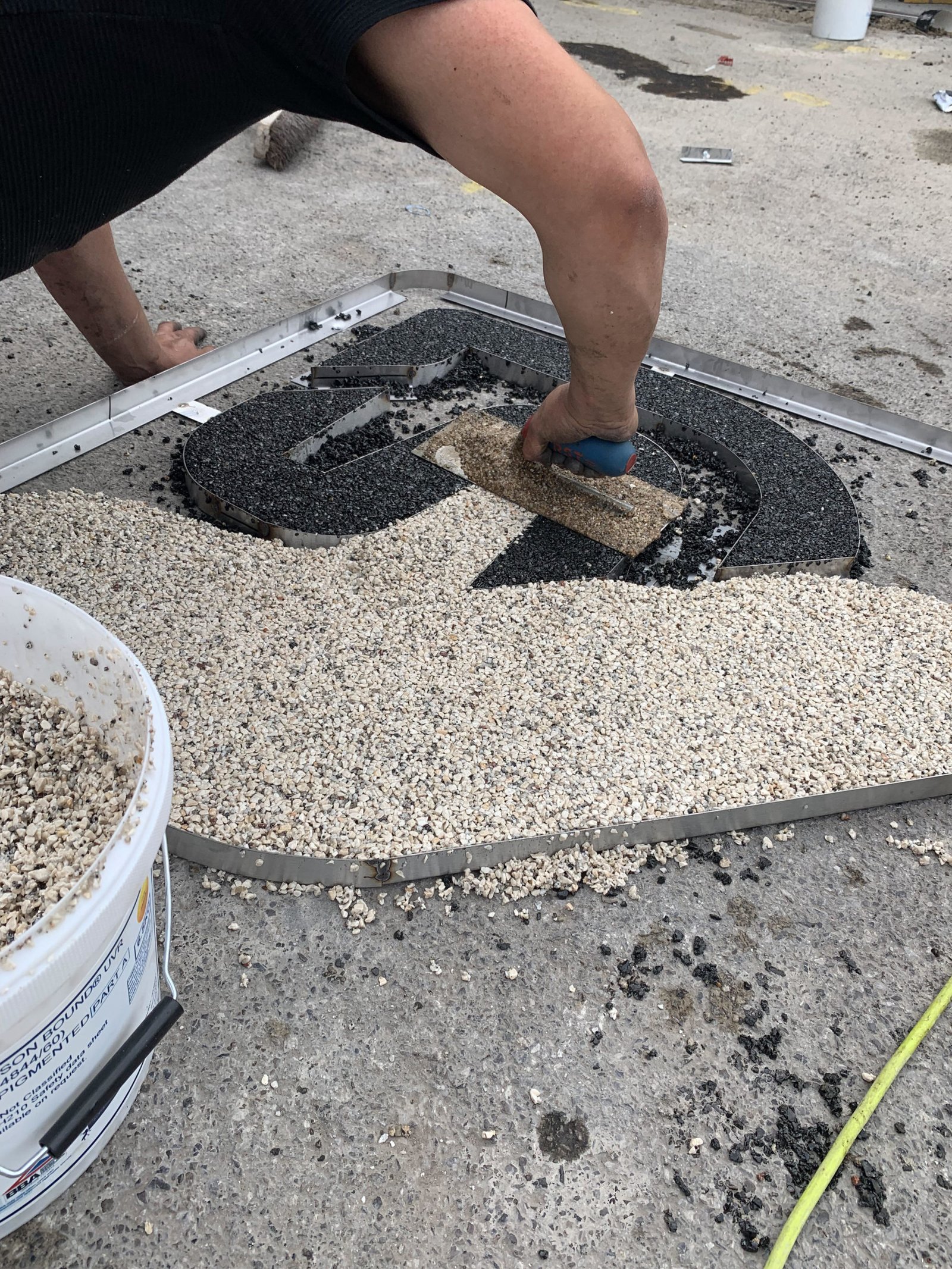 logo graphic driveway installation